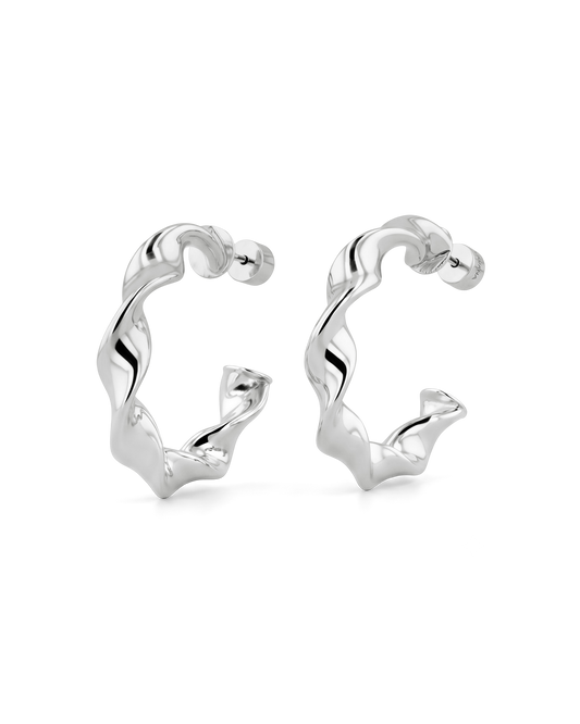 Image of Earrings. Product name - Muse Silver Hoop Earrings in colour by brand - LAVANA