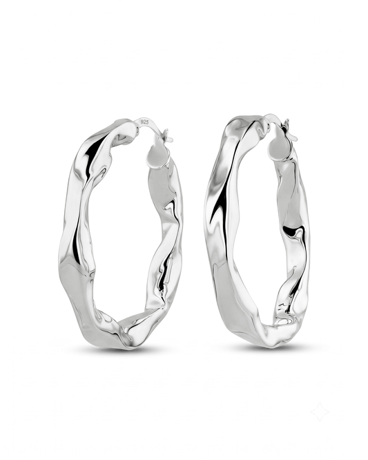 Image of Earrings. Product name - Musica Silver Hoop Earrings in colour by brand - LAVANA