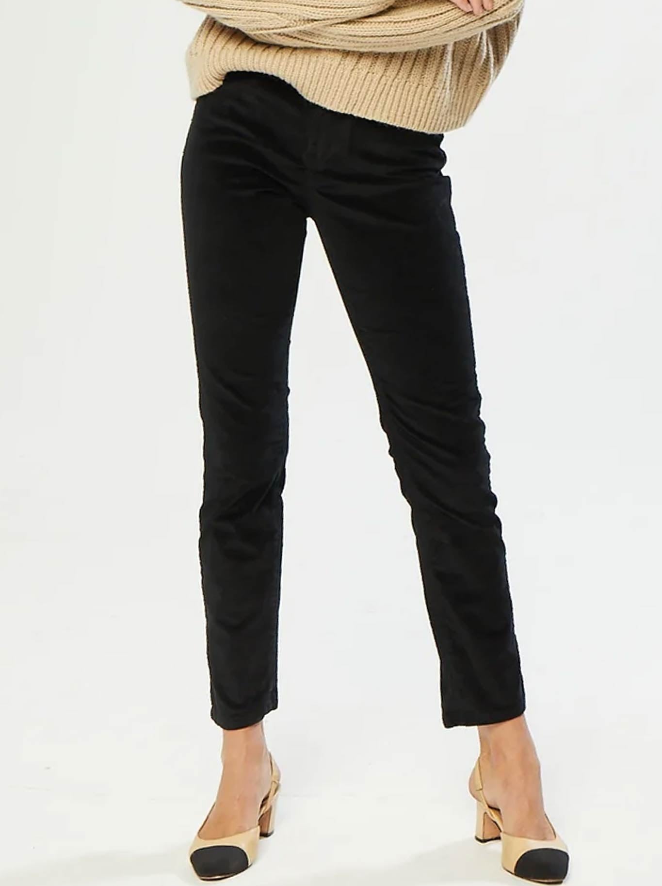 Image of a model wearing Pants. Product name - New London Corby Slim Cord in Black colour by brand - New London
