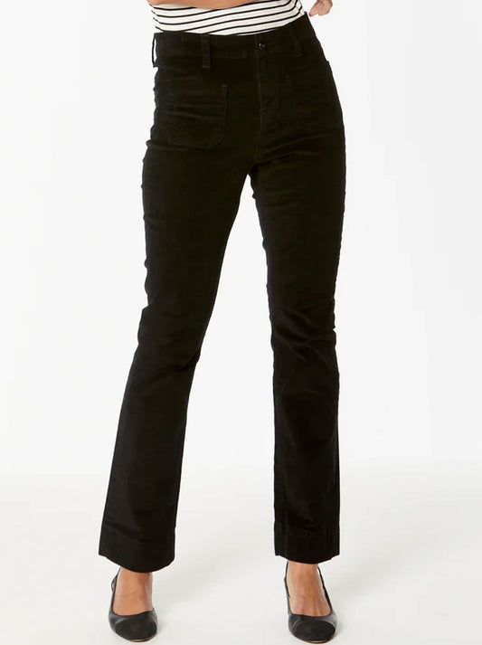 Image of a model wearing Pants. Product name - New London Fleet High-Rise Flare Cord in Black colour by brand - New London