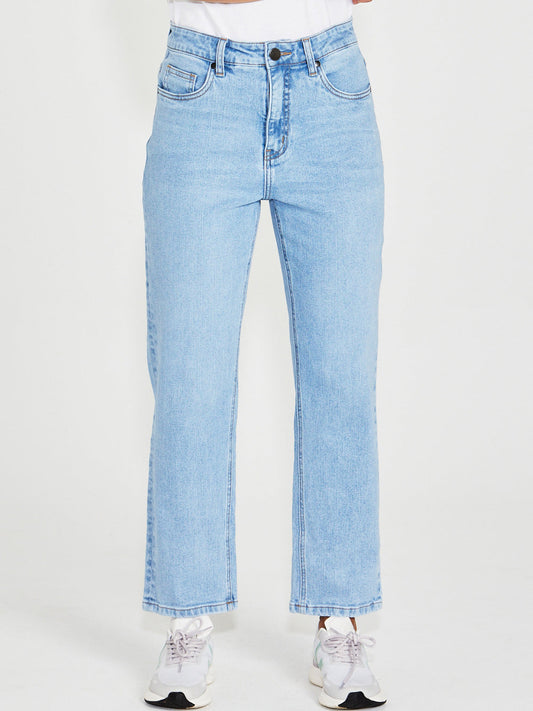 Image of a model wearing Pants. Product name - New London Combe Ankle Grazer Jean in Denim colour by brand - New London