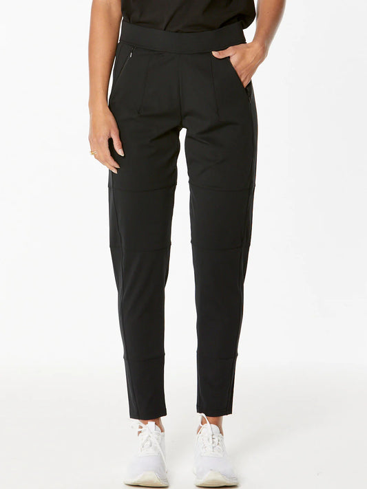Image of a model wearing Pants. Product name - New London Witney Jogger in Black colour by brand - New London