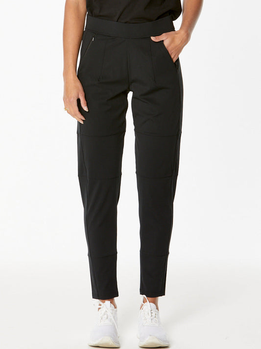 Image of a model wearing Pants. Product name - New London Witney Jogger in Black colour by brand - New London