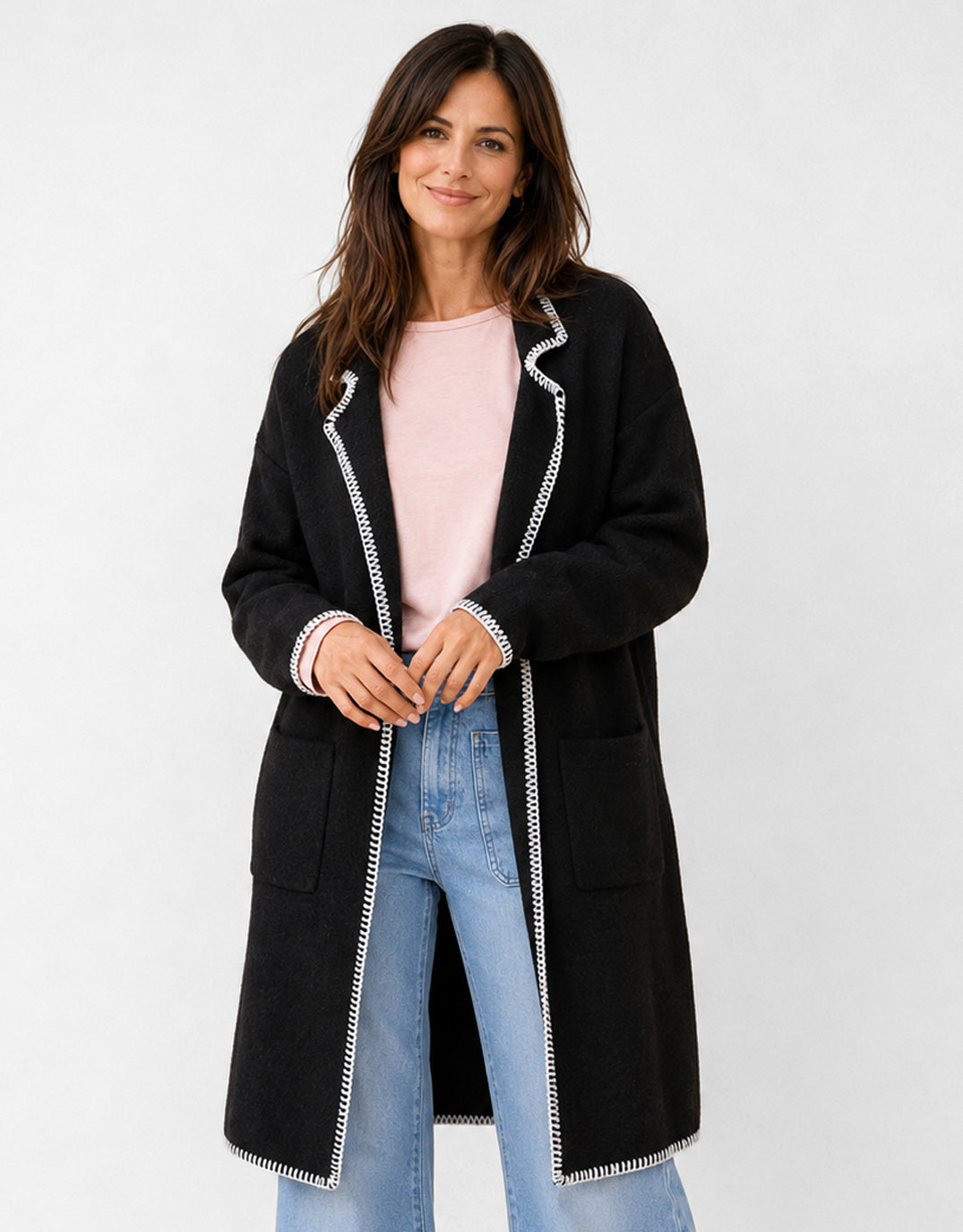 Image of a model wearing Outerwear. Product name - Noa Blanket Stitch Coatigan Black in Black colour by brand - 132 Fashion