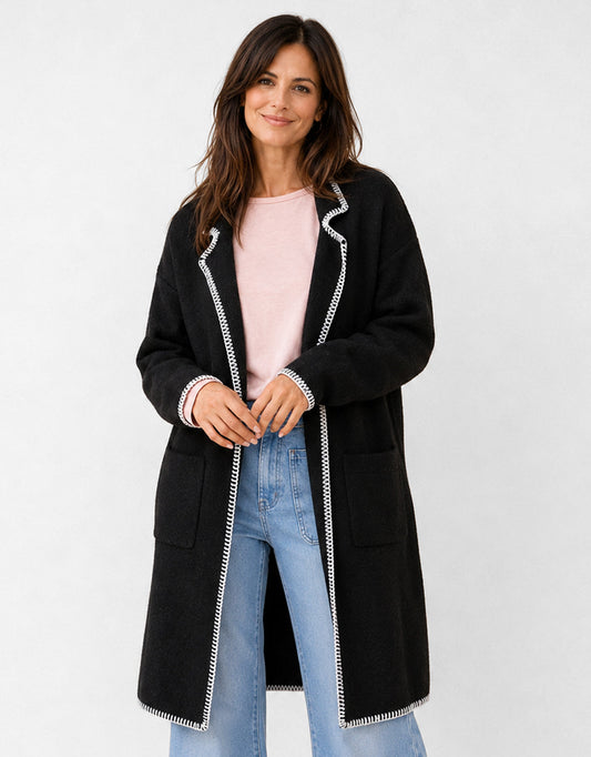 Image of a model wearing Outerwear. Product name - Noa Blanket Stitch Coatigan Black in Black colour by brand - 132 Fashion