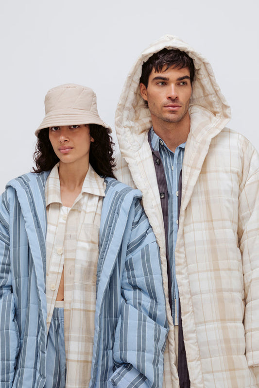 Image of Accessories. Product name - Doona Hat Oat Check in Oat Check colour by brand - NUNE