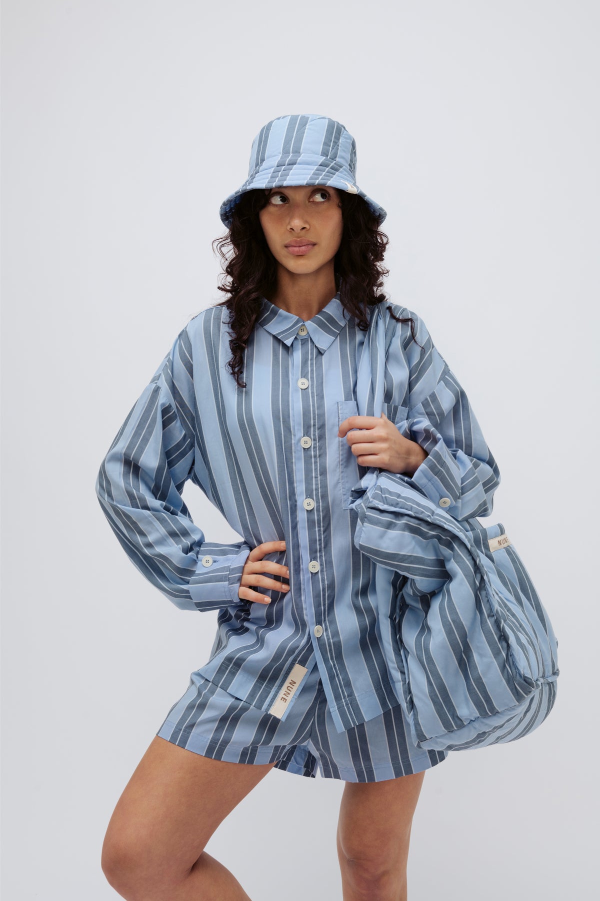 Image of Accessories. Product name - Doona Hat Daybreak Stripe in Daybreak Stripe colour by brand - NUNE