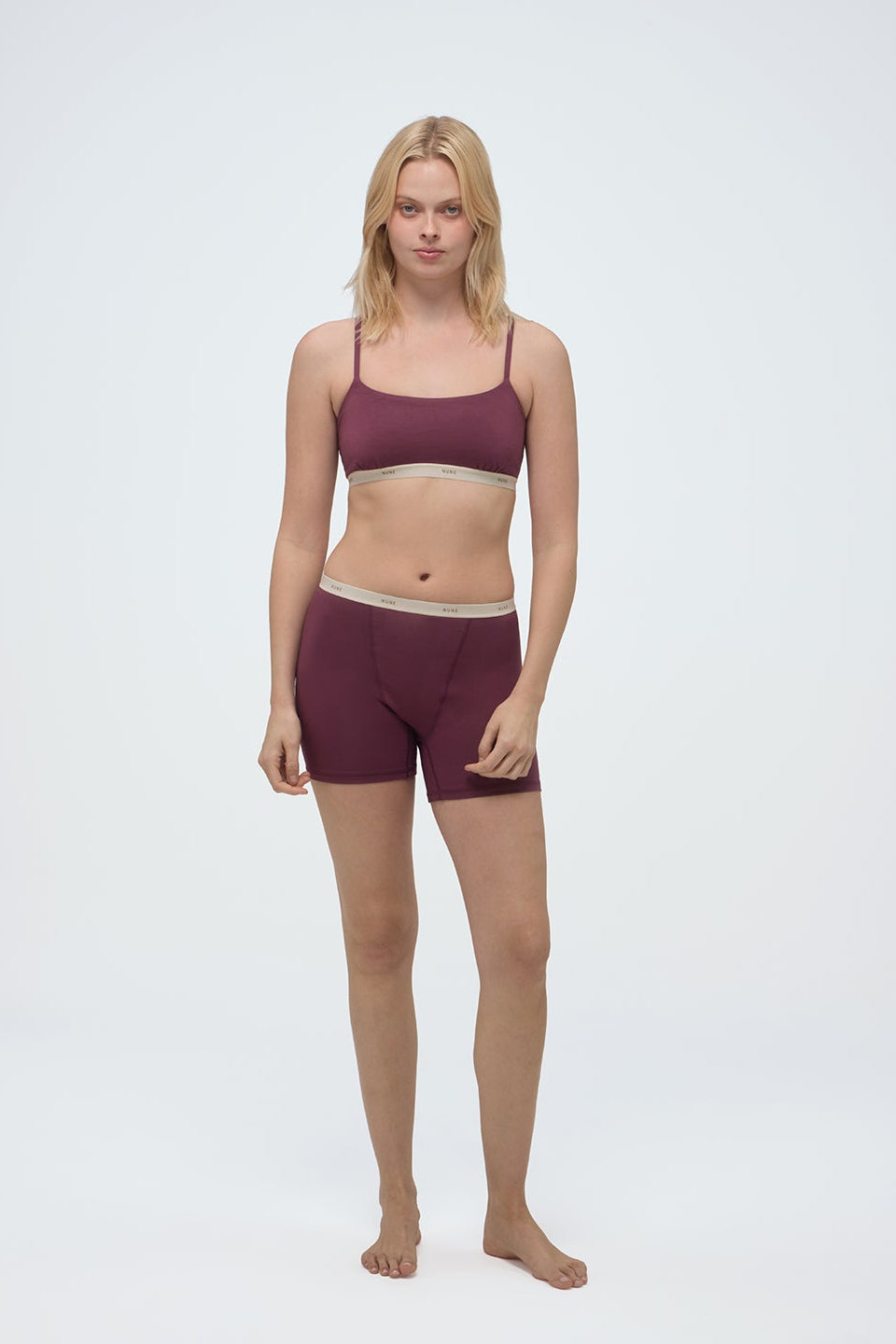 Image of a model wearing Tops. Product name - Square Neck Bralette Twilight in Twilight colour by brand - NUNE
