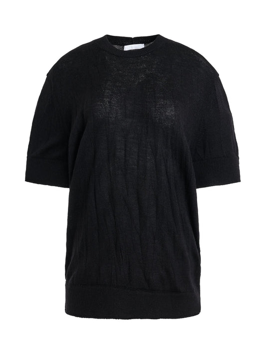 Image of a model wearing Tops. Productname: HELMUT LANG Crushed Knit T-Shirt in Black colour by brand - HELMUT LANG