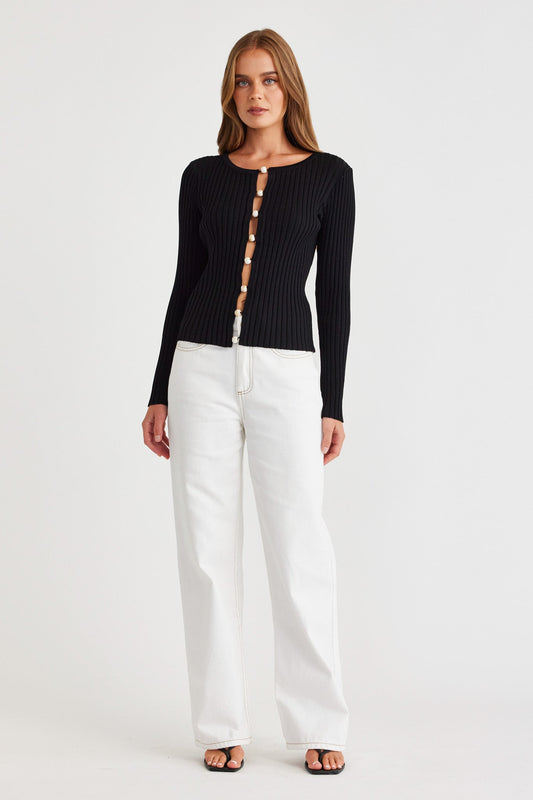 Image of a model wearing Tops. Productname: SNDYS ODETTA TOP in Black colour by brand - SNDYS