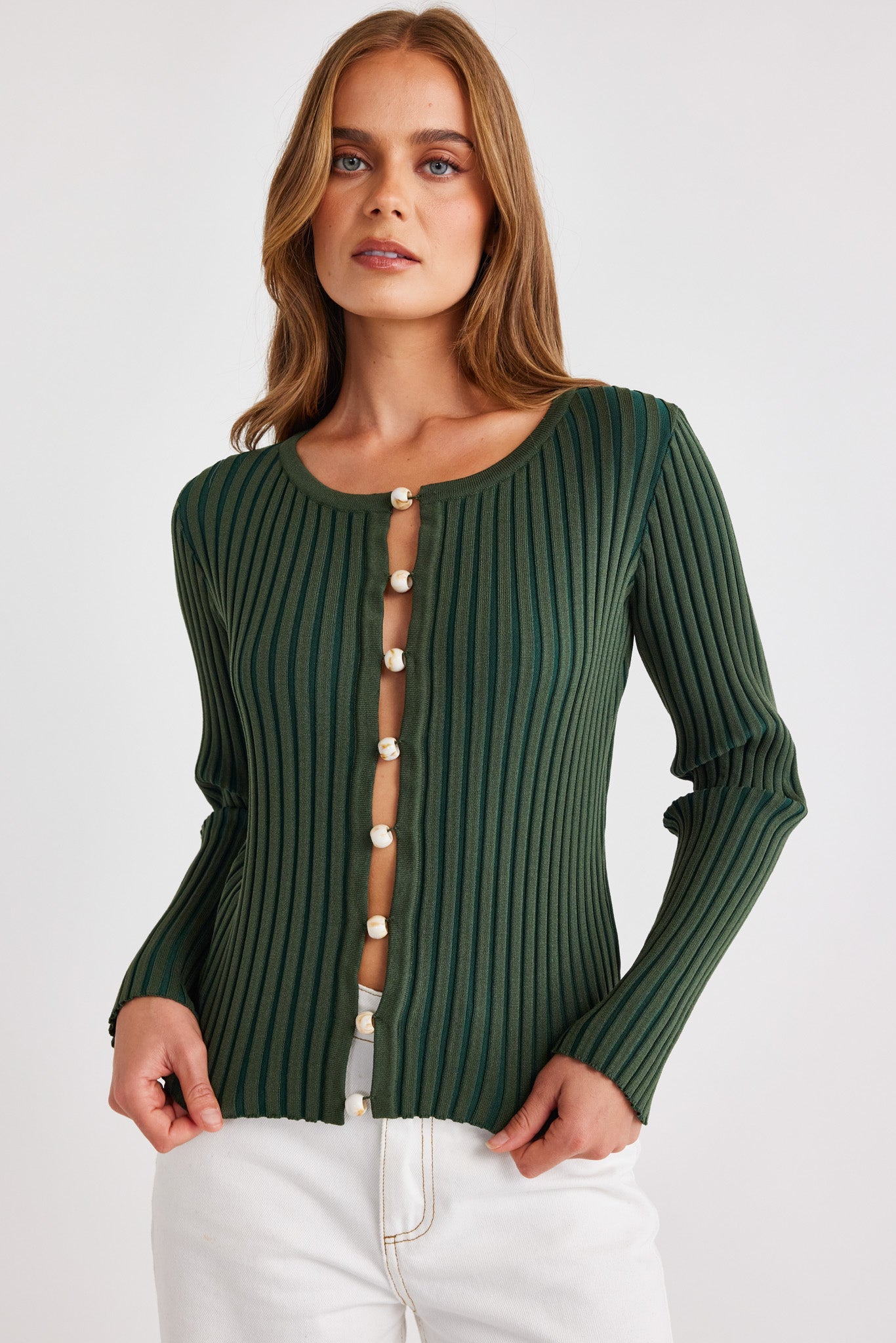 Image of a model wearing Tops. Productname: SNDYS ODETTA TOP in Wild Green colour by brand - SNDYS