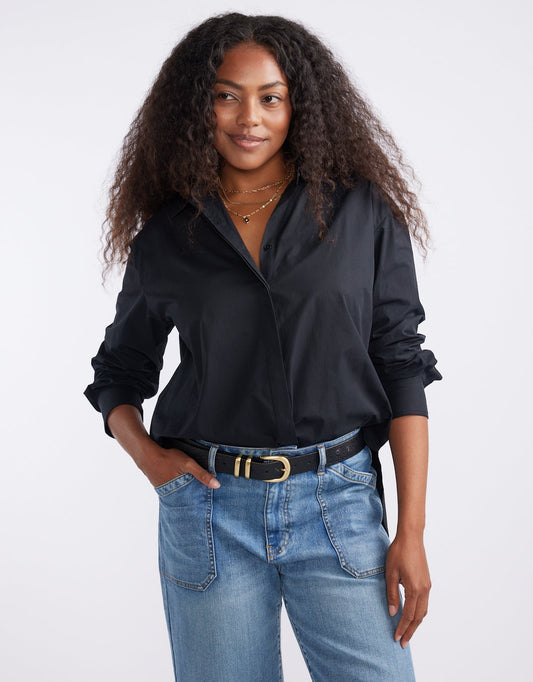 Image of a model wearing Tops. Productname: Carter Shirt - in Black colour by brand - White & Co.