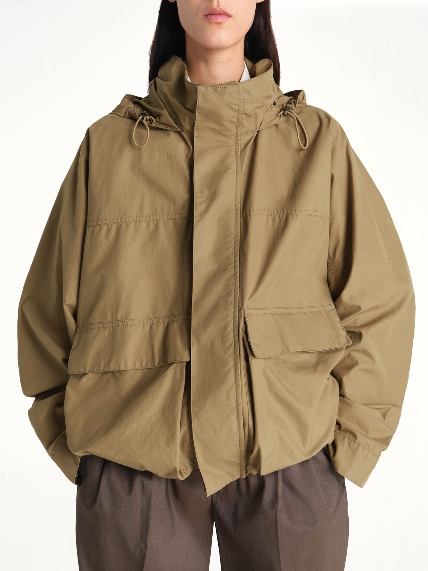 Image of Coats & Jackets. Product name - Short Rain Parka in Khaki colour by brand - LEMAIRE