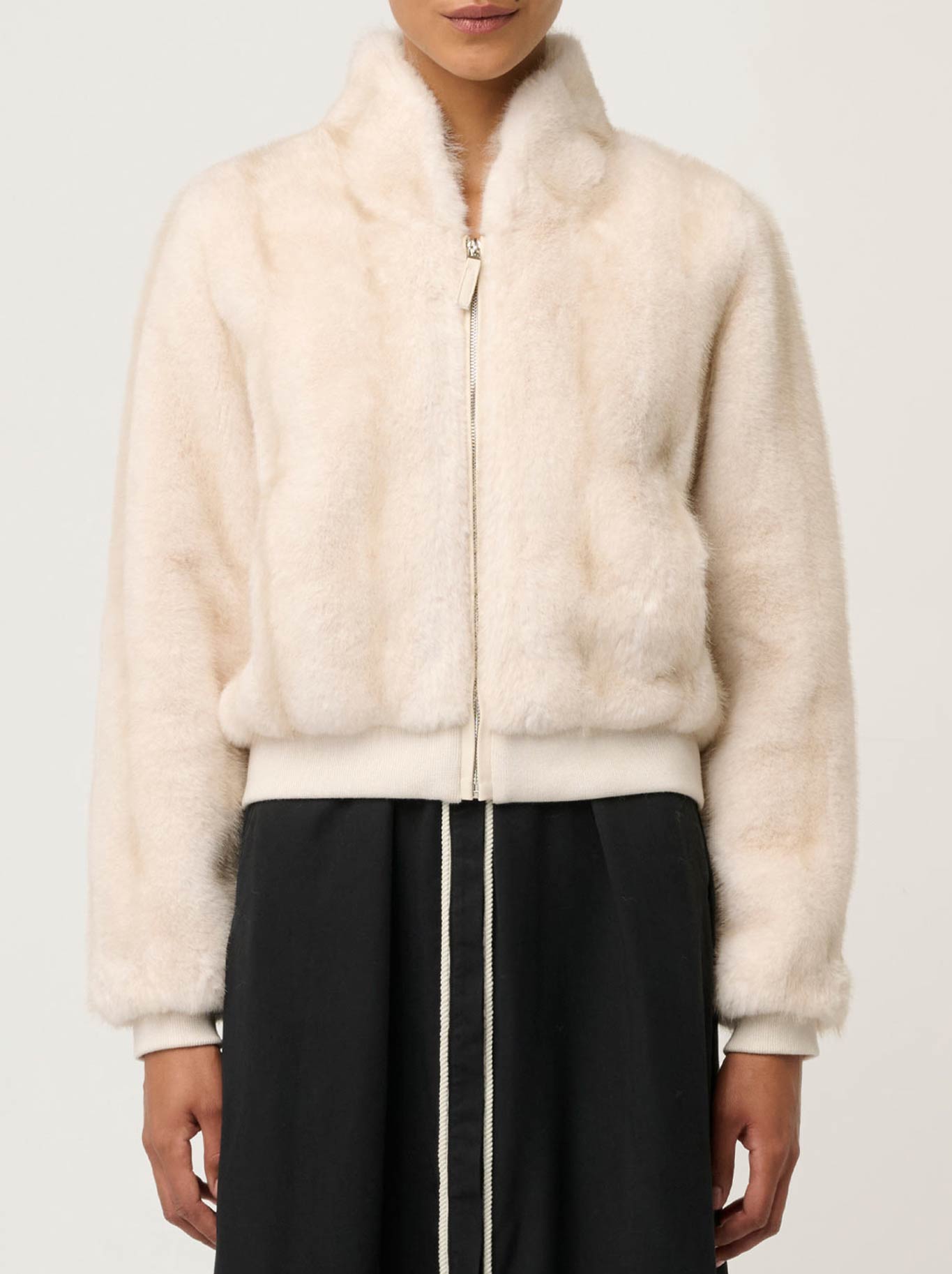 Image of a model wearing Outerwear. Productname: Once Was Chrysta Faux Fur Bomber in Porcelain colour by brand - Once Was