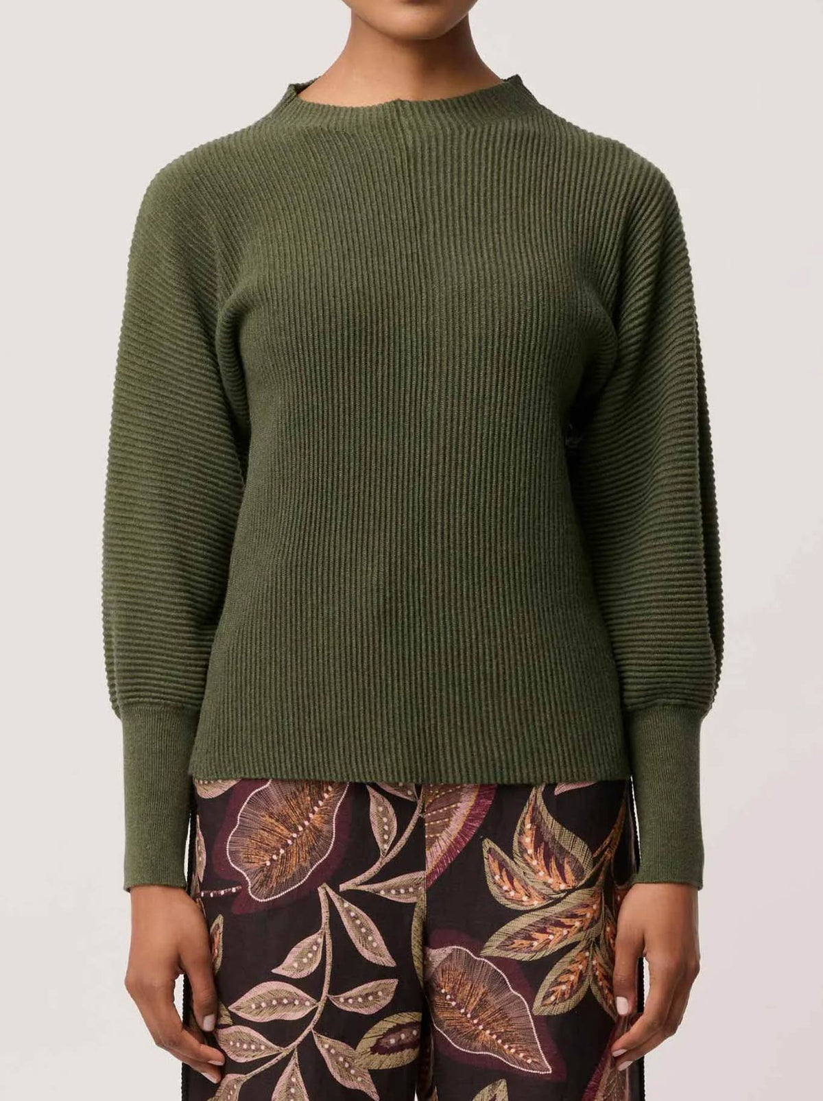 Image of a model wearing Outerwear. Product name - Once Was Roselle Knit in Winter Moss colour by brand - Once Was