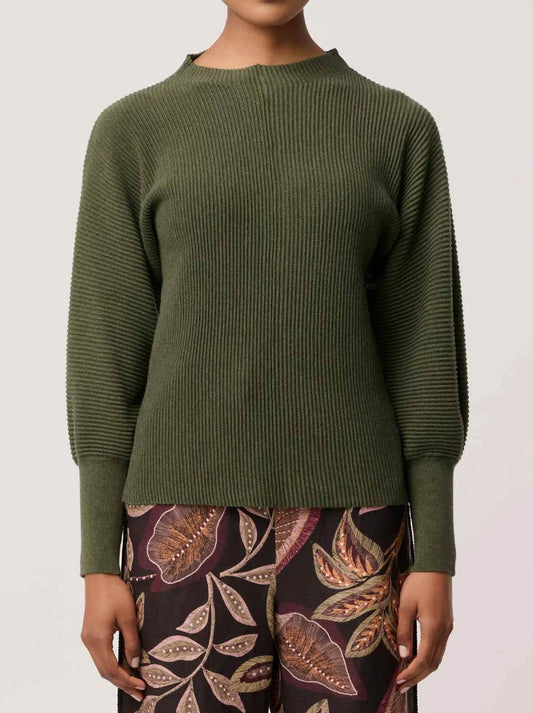 Image of a model wearing Outerwear. Product name - Once Was Roselle Knit in Winter Moss colour by brand - Once Was