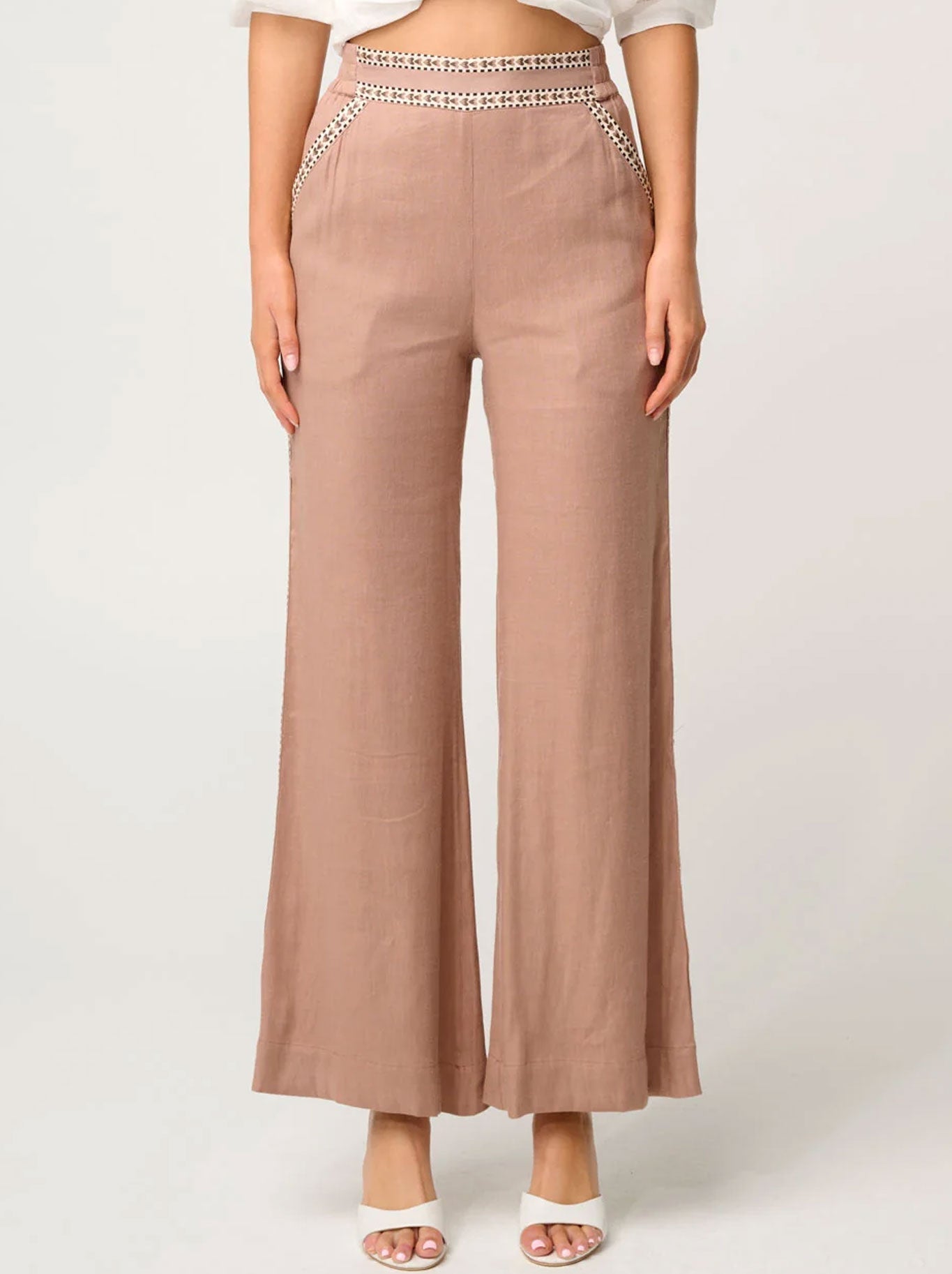 Image of a model wearing Pants. Productname: ONCE WAS ZARA PANT in Dune colour by brand - Once Was