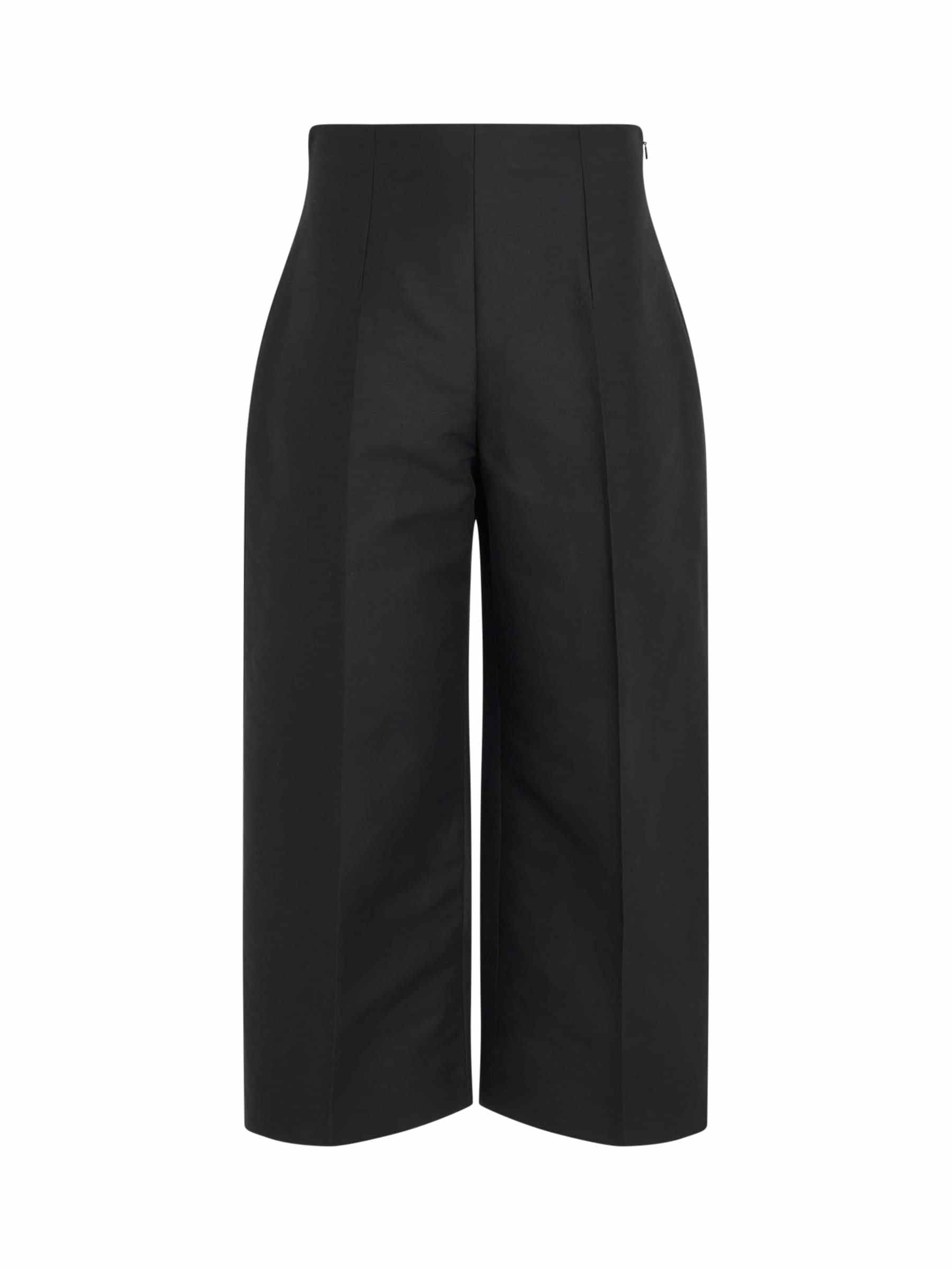 Image of a model wearing Pants. Productname: MARNI High Waisted Straight Leg Pants in Black colour by brand - MARNI