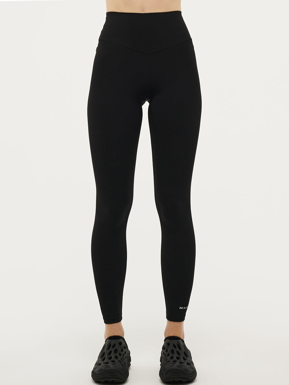Image of a model wearing Pants. Productname: P.E NATION SIGNATURE FULL LEGGING in Black colour by brand - P.E Nation
