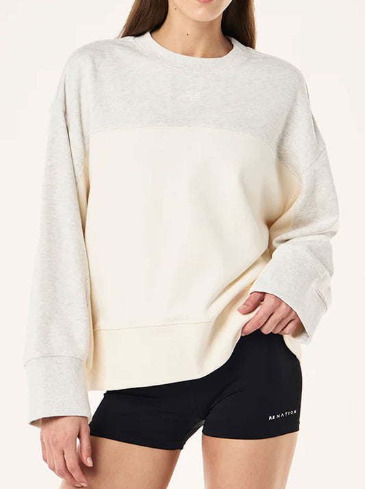 Image of a model wearing Outerwear. Productname: P.E NATION CLUB SWEAT in Grey Marle Whispher White colour by brand - P.E Nation