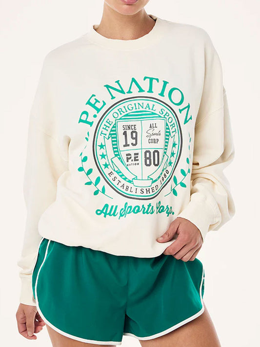 Image of a model wearing Outerwear. Productname: P.E NATION DEFEND SWEAT in Whisper White colour by brand - P.E Nation