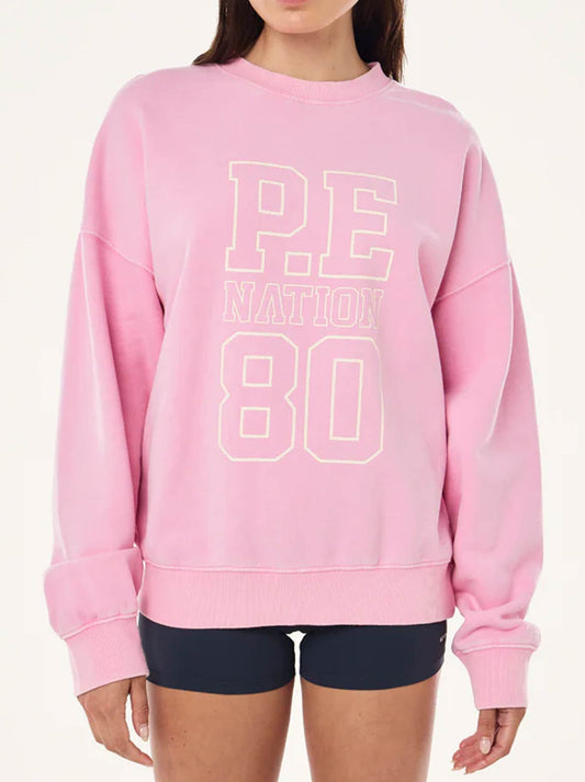 Image of a model wearing Outerwear. Productname: P.E NATION ELYSIAN SWEAT in Prism colour by brand - P.E Nation