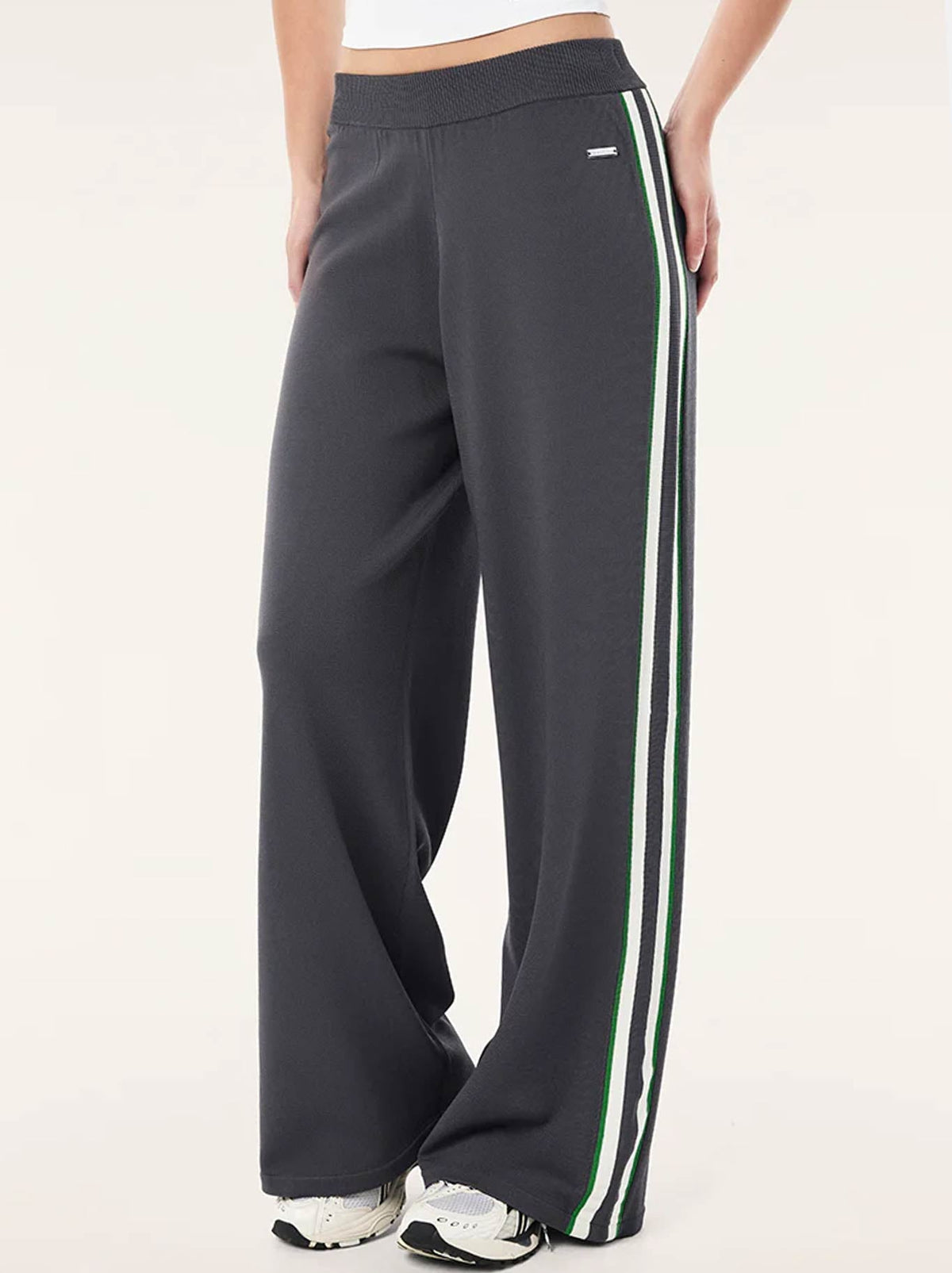 Image of a model wearing Pants. Product name - P.E NATION RETREAT KNIT PANT in Iron Grey colour by brand - P.E Nation