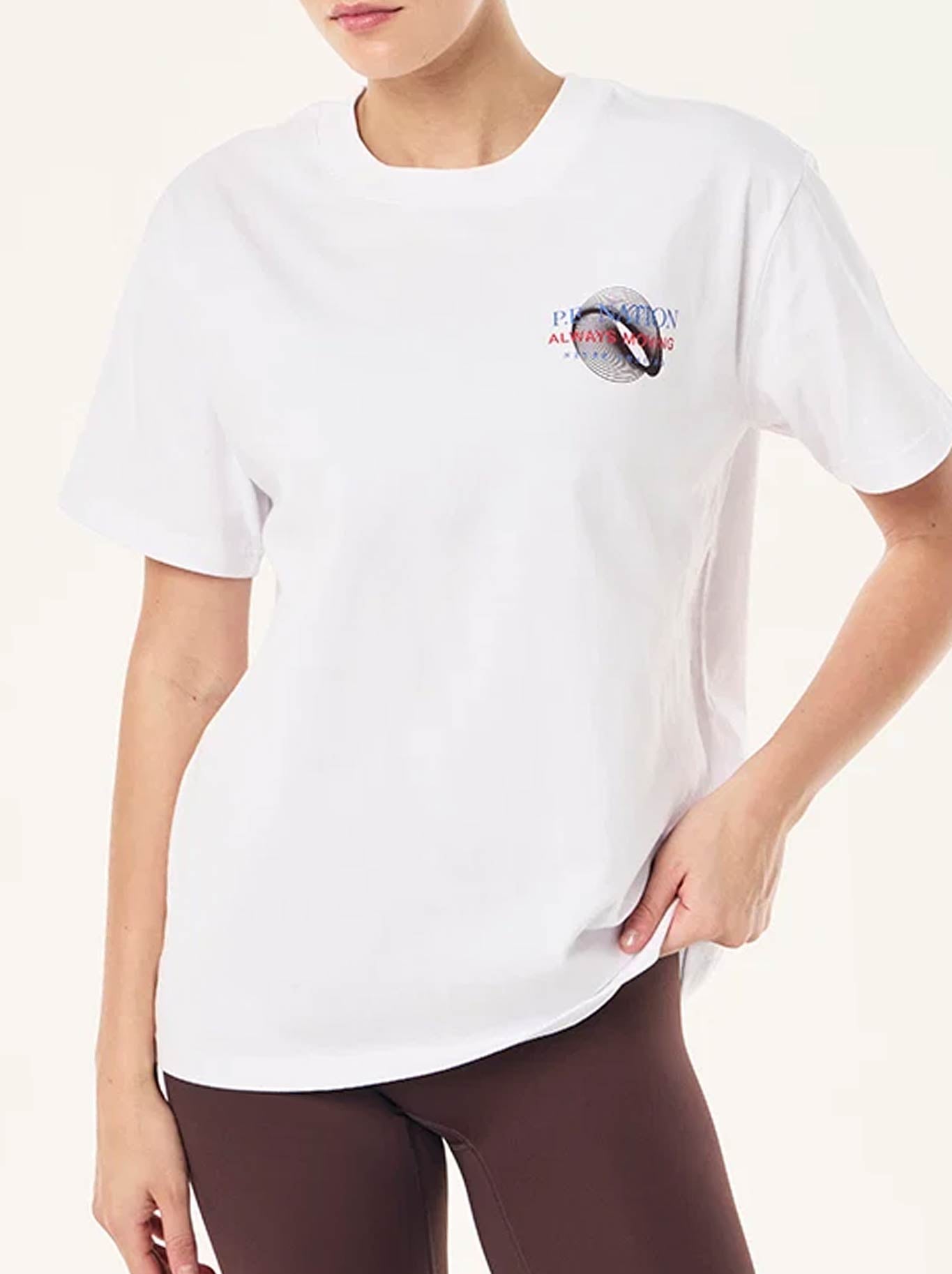 Image of a model wearing Tops. Product name - P.E NATION SNAP RELAXED FIT TEE in White colour by brand - P.E Nation