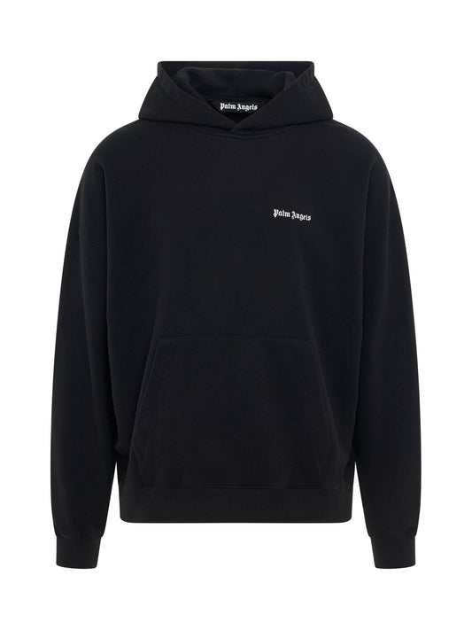 Image of a model wearing Outerwear. Productname: PALM ANGELS Cotton Embroidered Logo Hoodie in BLACK colour by brand - PALM ANGELS