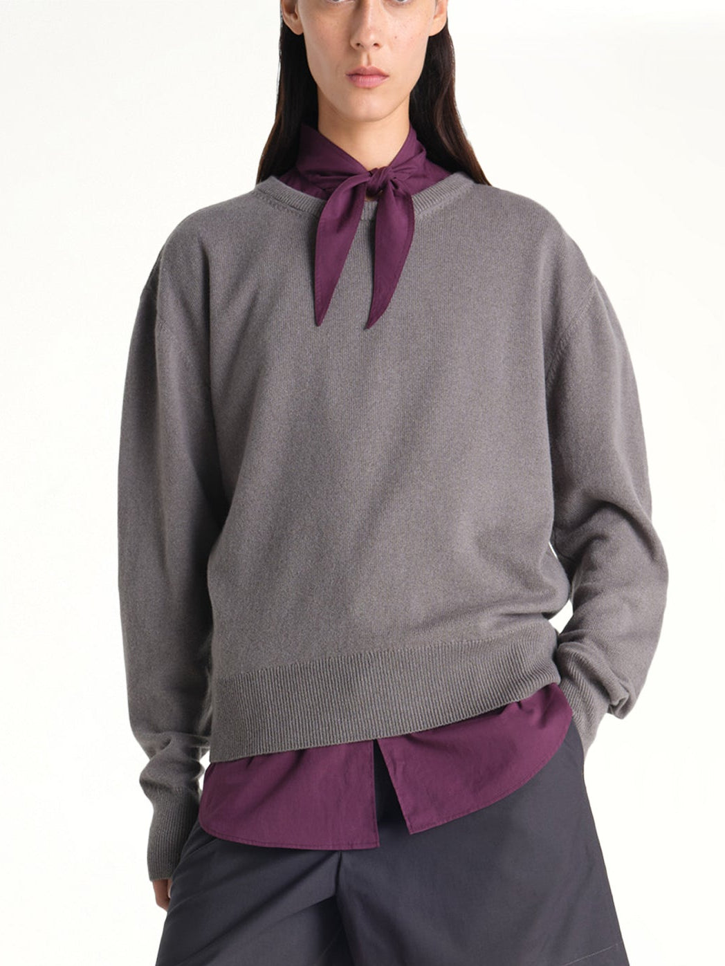 Image of a model wearing Outerwear. Product name - Crew Neck Sweater in Grey colour by brand - LEMAIRE