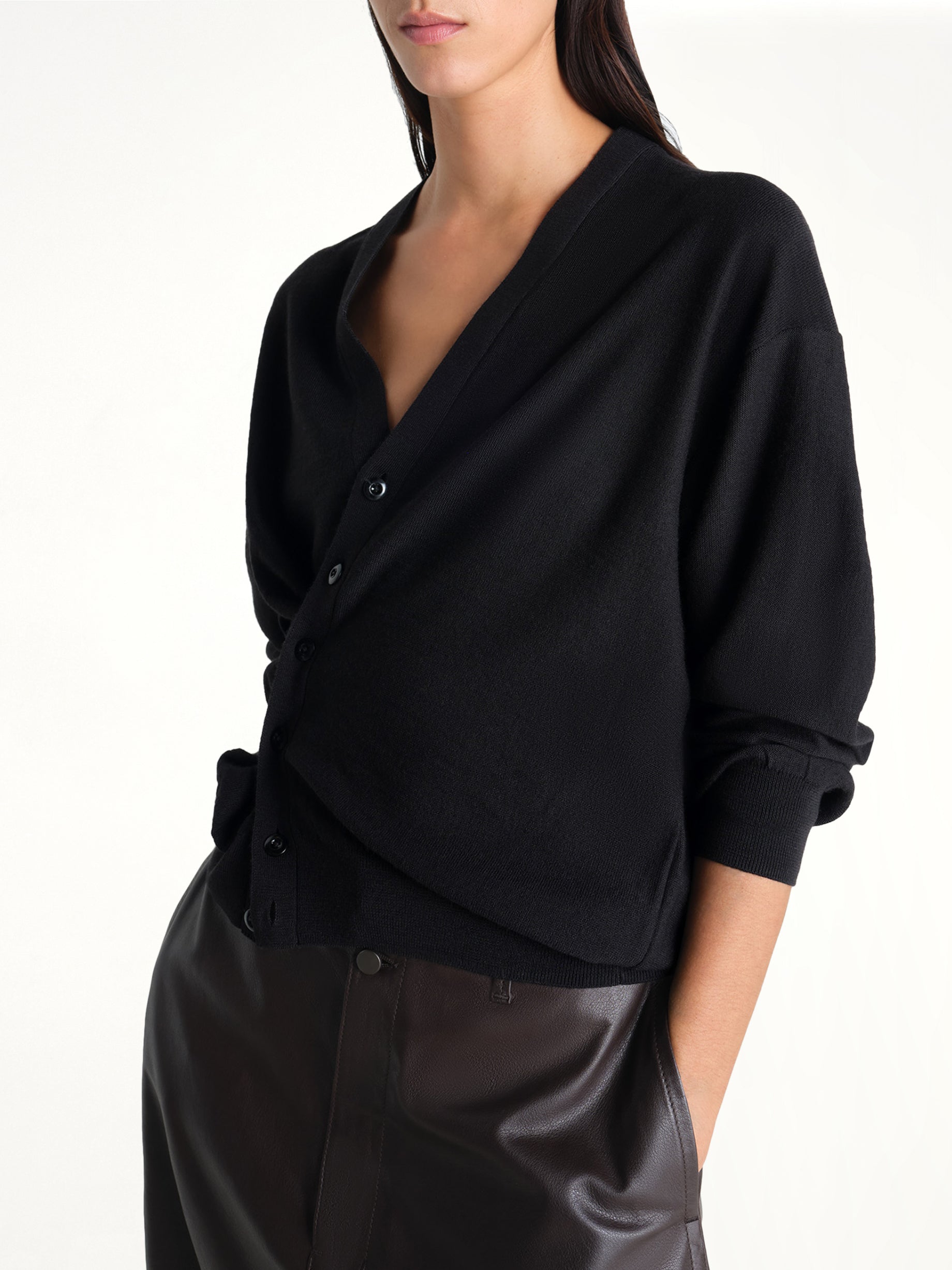 Image of Cardigans. Product name - Twisted Cardigan in Black colour by brand - LEMAIRE