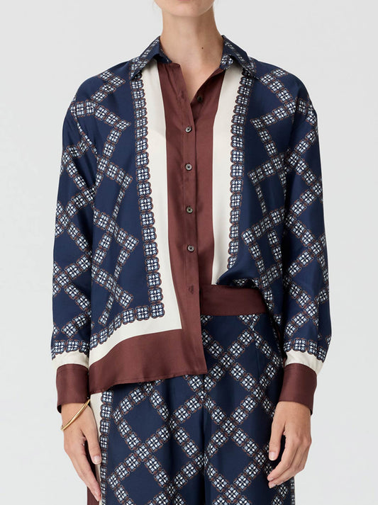 Image of a model wearing Tops. Product name - Pol Eden Silk Shirt in Eden colour by brand - Pol