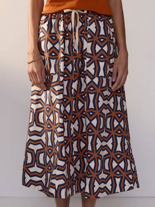 Image of a model wearing Skirts. Product name - POL HALI SKIRT in Hali Print colour by brand - Pol