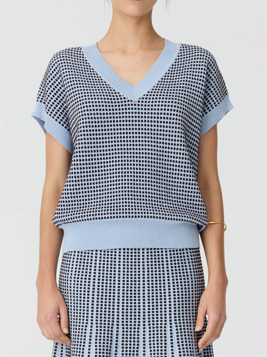 Image of a model wearing Tops. Product name - Pol Evlyn Knit Top in Blue Choc colour by brand - Pol