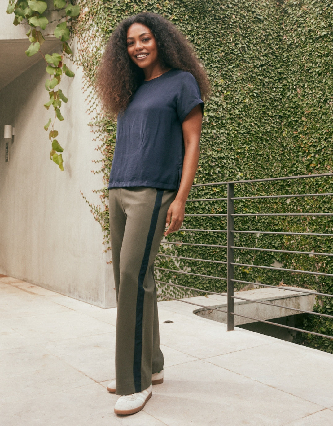 Image of a model wearing Pants. Productname: Timeless Straight Leg Ponte Pant - in Khaki / Navy colour by brand - White & Co.