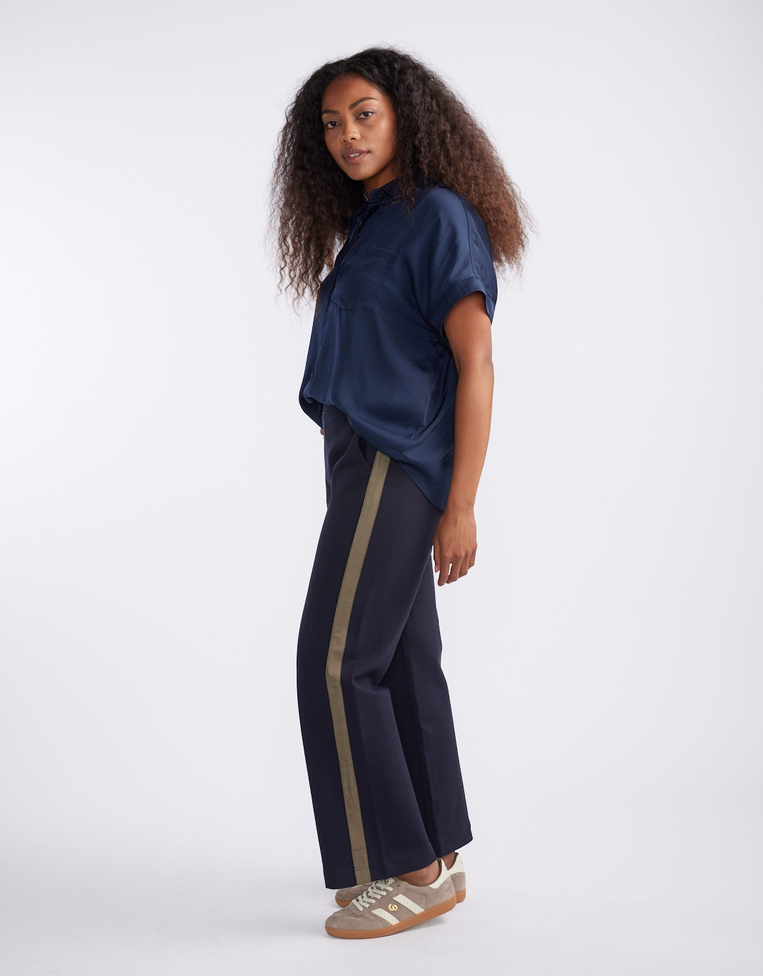 Image of a model wearing Pants. Productname: Timeless Straight Leg Ponte Pant - in Navy/Khaki colour by brand - White & Co.