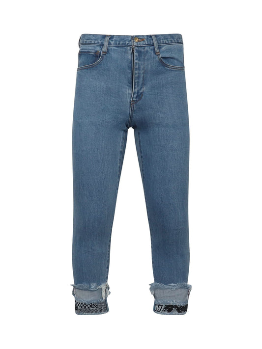 Image of a model wearing Denim. Productname: FACETASM Cropped Print Denim Pants in BLUE colour by brand - FACETASM