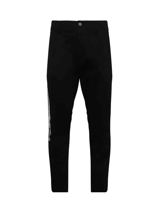 Image of a model wearing Pants. Productname: FACETASM Barcode Print Chino Pants in BLACK colour by brand - FACETASM