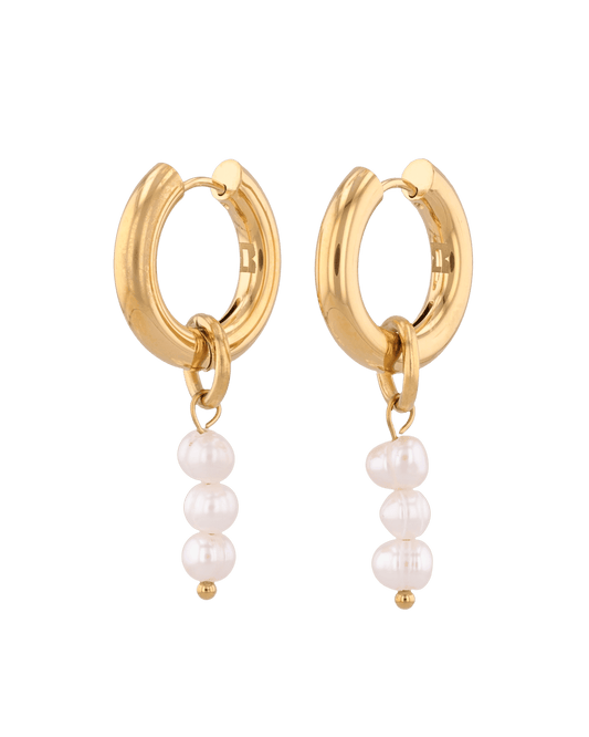 Image of Earrings. Product name - Pebble Pearl Charm Gold Huggie Earrings in colour by brand - LAVANA