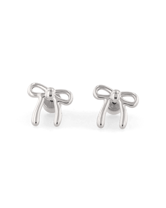 Image of Earrings. Product name - Petite Bow Silver Stud Earrings in colour by brand - LAVANA