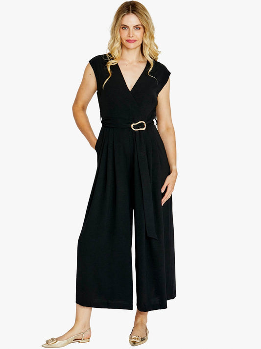Image of a model wearing Pants. Product name - PINGPONG AVERY WRAP JUMPSUIT in Black colour by brand - Ping Pong