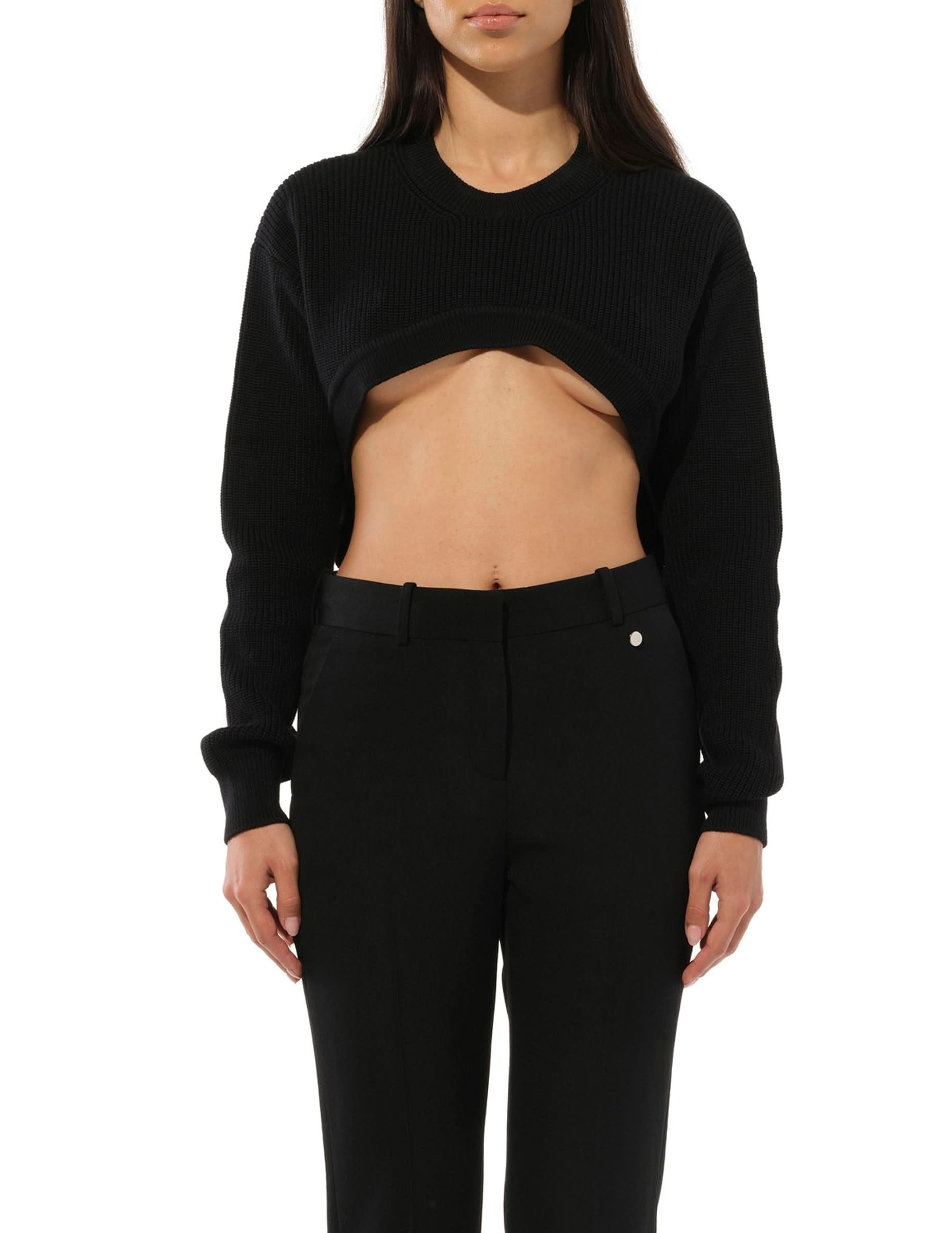 Image of a model wearing Outerwear. Productname: GIVENCHY Podium Long Sleeve Sweater in Black colour by brand - GIVENCHY