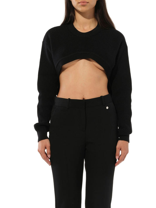 Image of a model wearing Outerwear. Productname: GIVENCHY Podium Long Sleeve Sweater in Black colour by brand - GIVENCHY