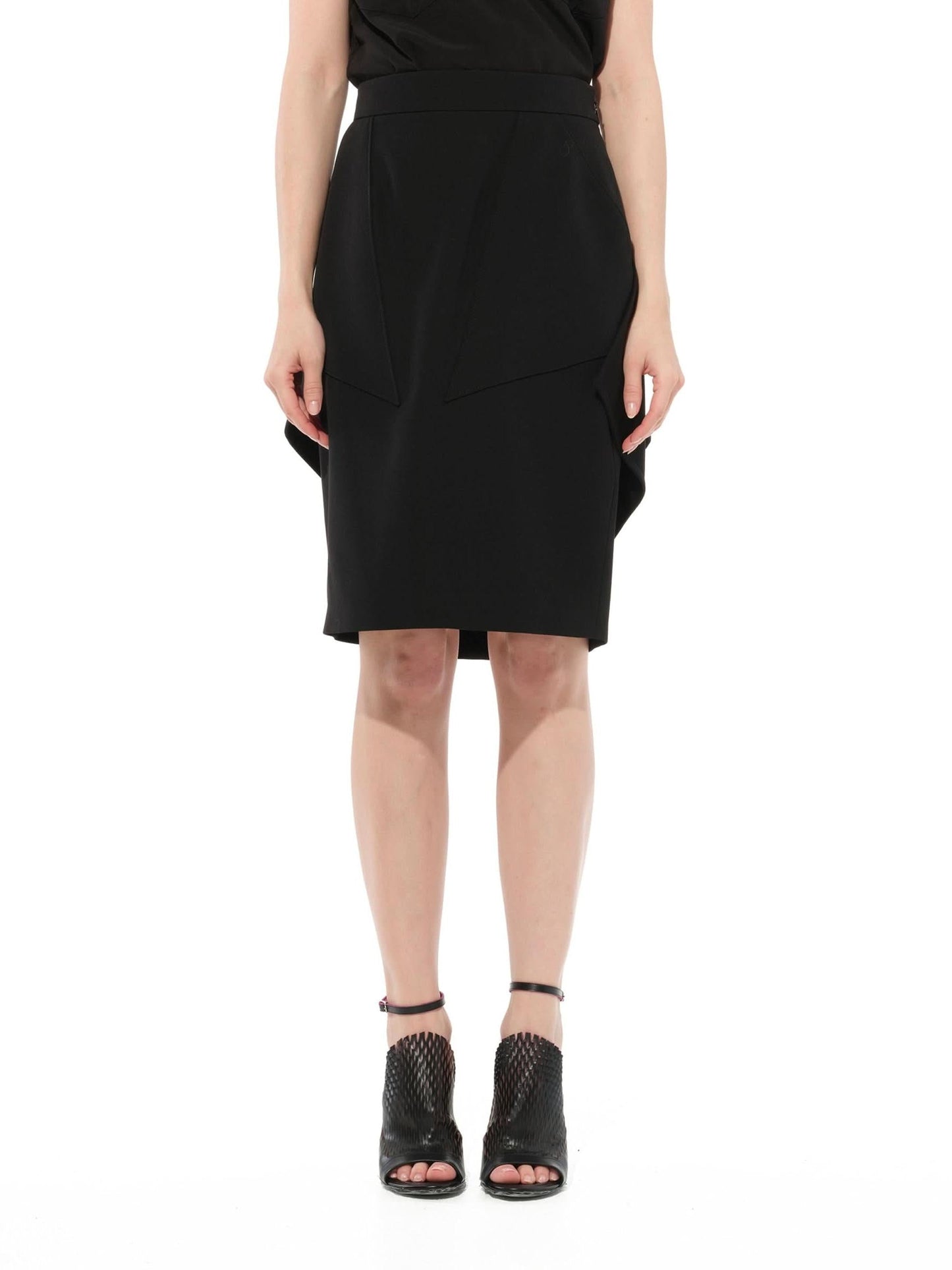 Image of a model wearing Skirts. Product name - Podium Skirt in Black colour by brand - GIVENCHY