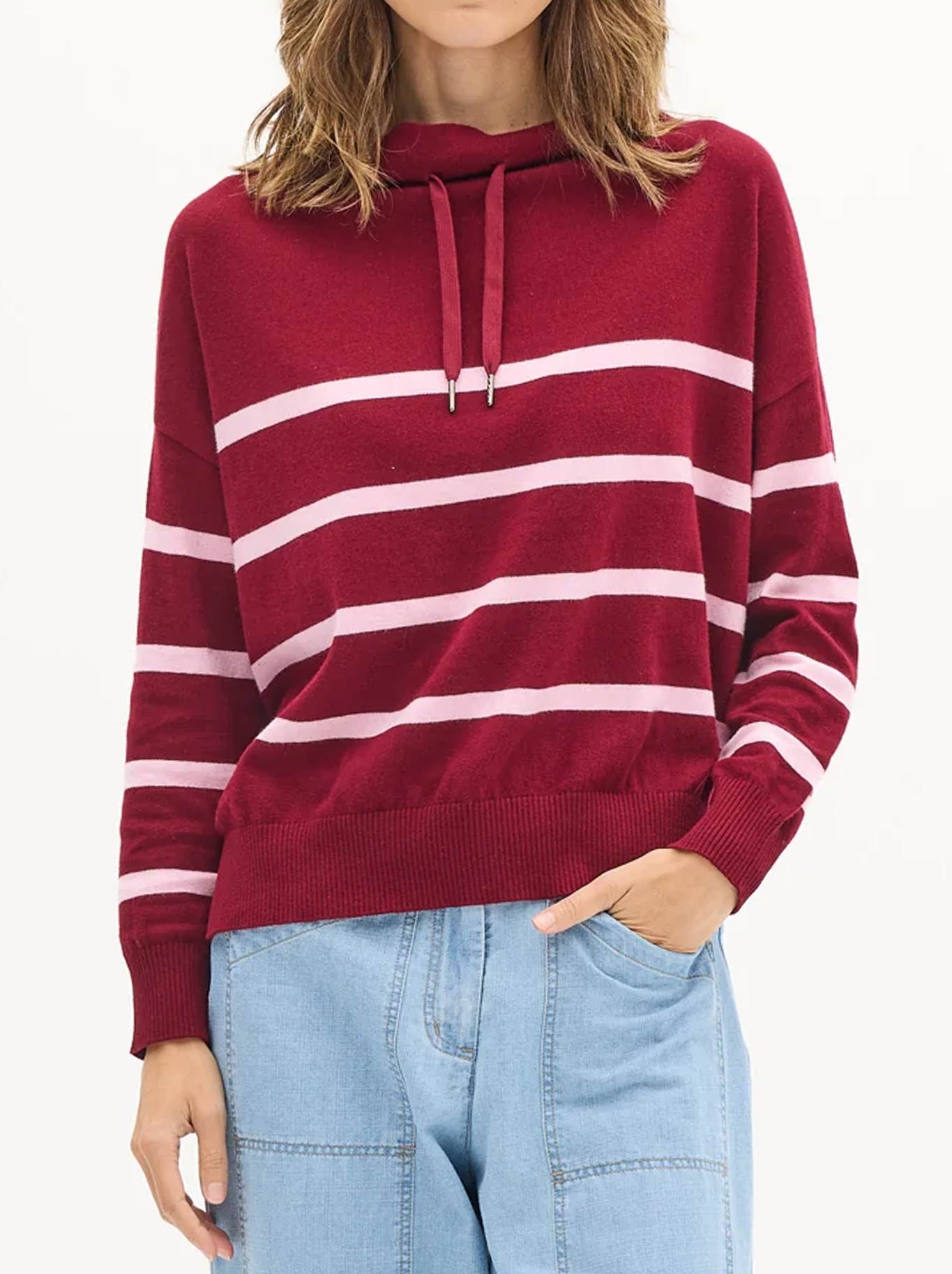 Image of a model wearing Outerwear. Product name - POL ROWAN DRAWCORD KNIT in Berry Pink colour by brand - Pol