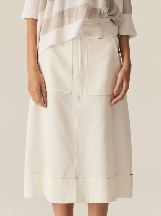 Image of a model wearing Skirts. Product name - Pol Carsen Denim Skirt in Dark Denim colour by brand - Pol