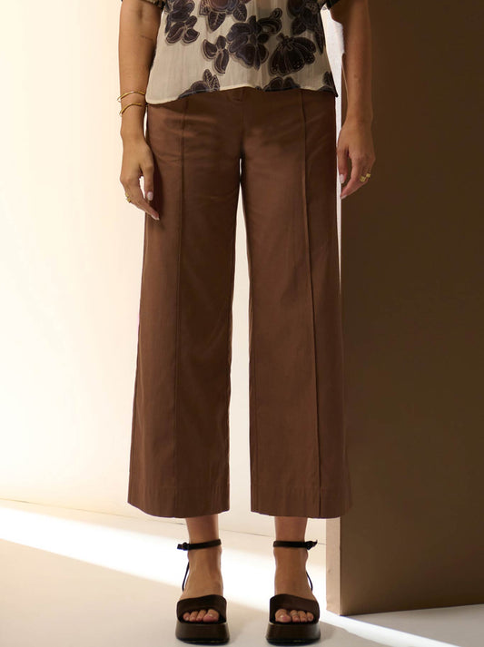 Image of a model wearing Pants. Productname: POL ODETTE BELTED PANT in Chocolate colour by brand - Pol