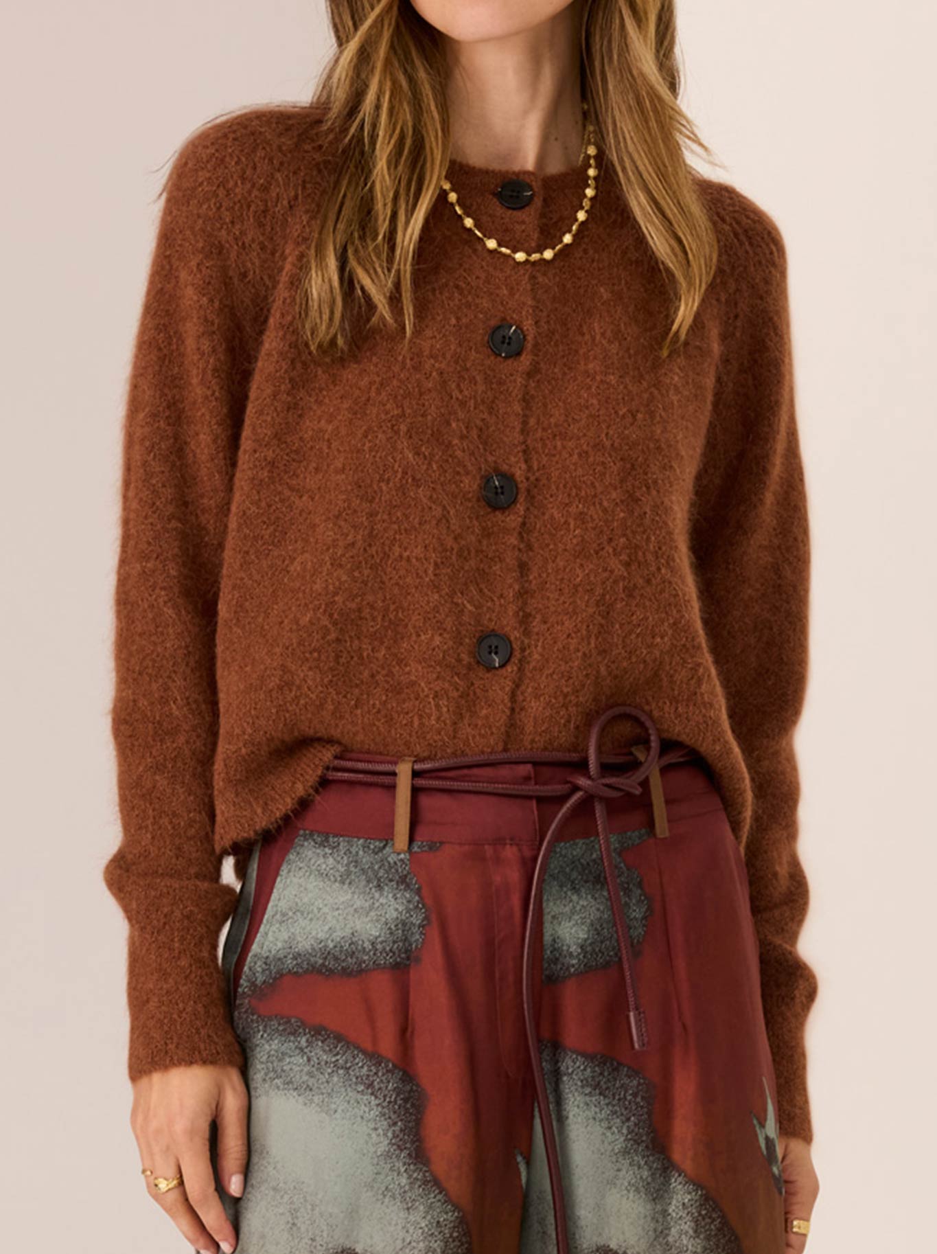 Image of a model wearing Outerwear. Productname: Pol Haviland Cardi in Toffee colour by brand - Pol