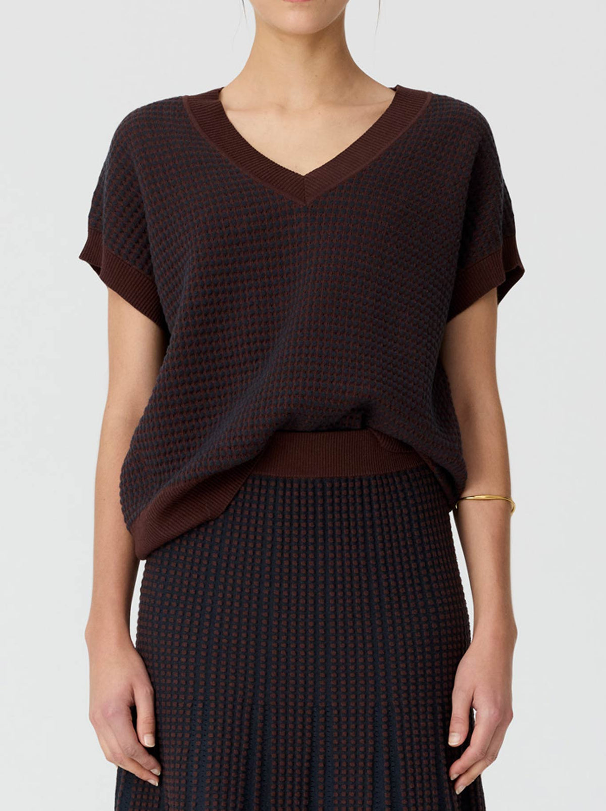 Image of a model wearing Tops. Product name - POL EVLYN KNIT TOP in Chocolate/Ink colour by brand - Pol