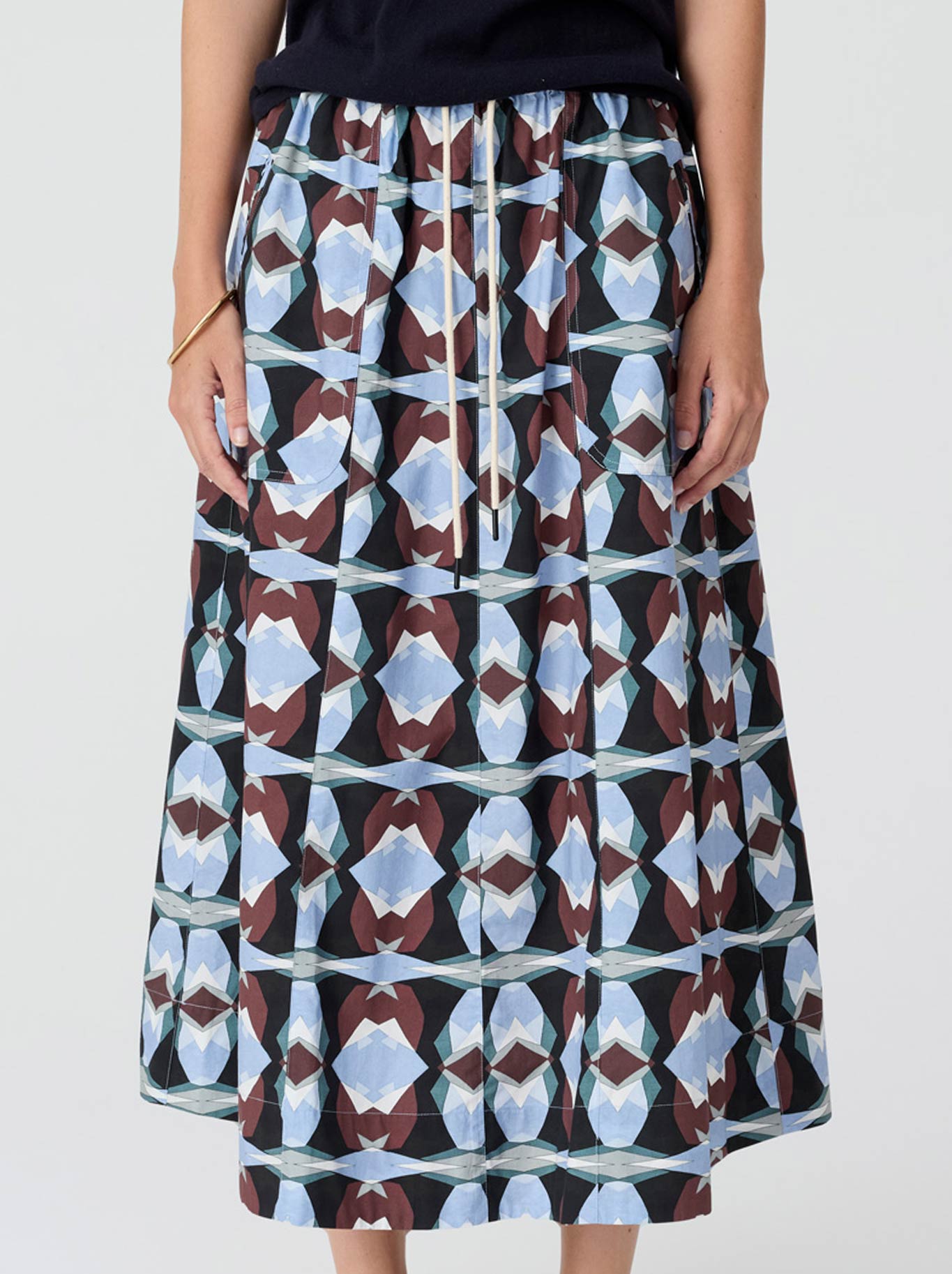 Image of a model wearing Skirts. Product name - Pol Thyra Skirt in Thyra Print colour by brand - Pol